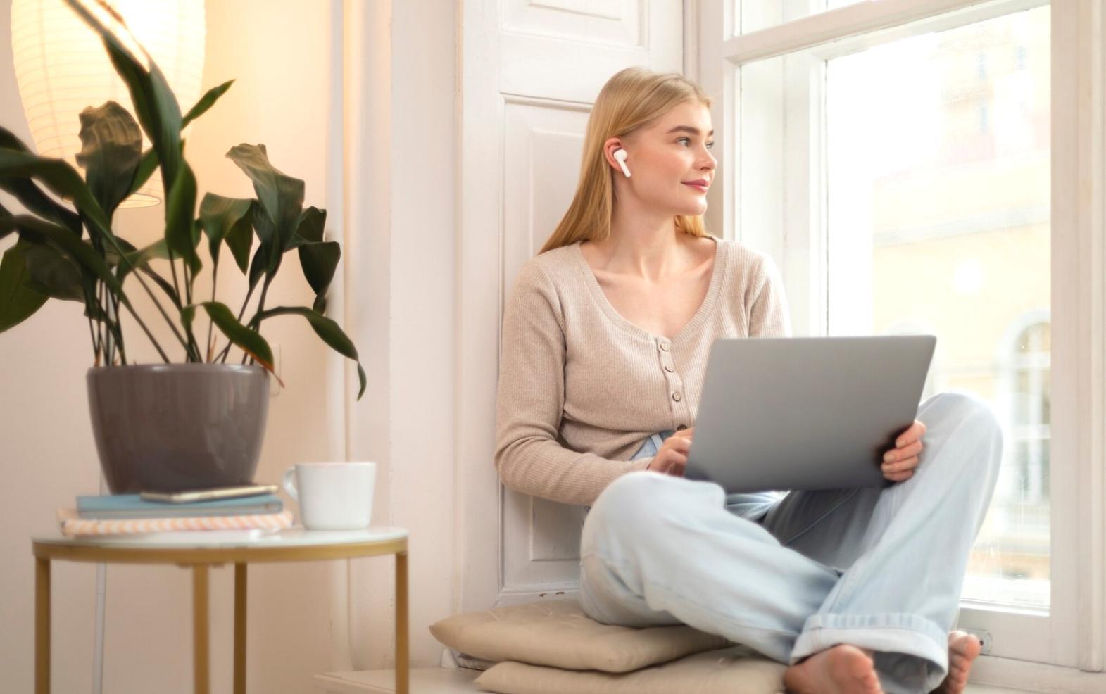 Business owner reviewing financial reports with focused attention